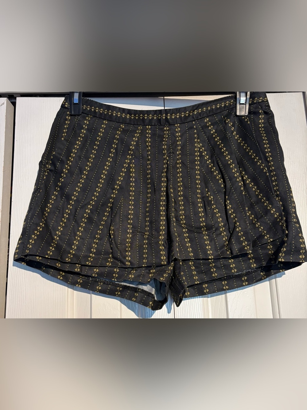 Free People Black Skort with Gold Geometric Stripe, pockets and side zip